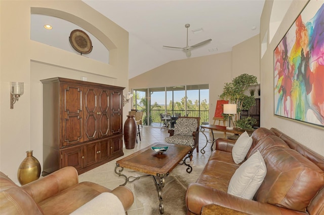 tiled living room with high vaulted ceiling, a ceiling fan, and recessed lighting