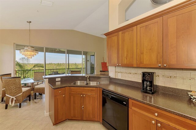 kitchen featuring lofted ceiling, a peninsula, a sink, brown cabinets, and dishwasher