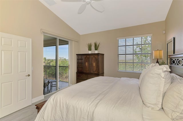 bedroom with baseboards, lofted ceiling, ceiling fan, wood finished floors, and access to outside