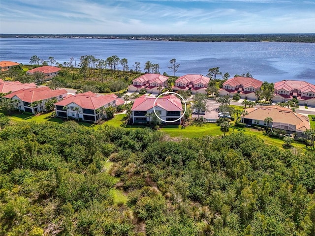 aerial view featuring a water view and a residential view