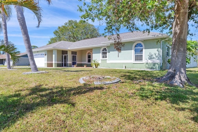 single story home featuring stucco siding, an attached garage, and a front yard