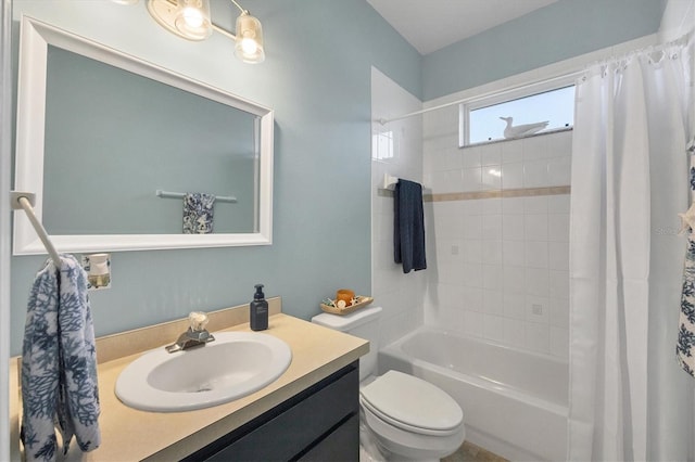 bathroom featuring toilet, shower / bathtub combination with curtain, and vanity