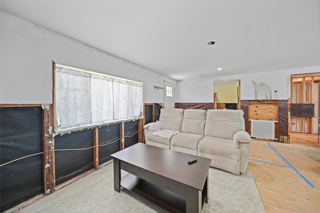 living room with recessed lighting and visible vents