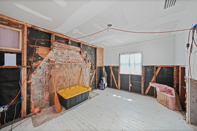 unfinished attic featuring visible vents