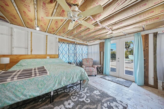 bedroom featuring access to outside and french doors