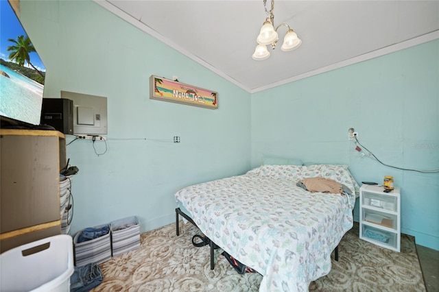 bedroom featuring ornamental molding, a chandelier, and vaulted ceiling