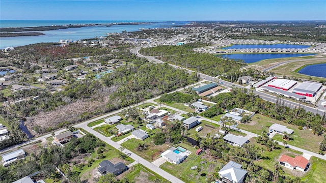 aerial view with a residential view and a water view