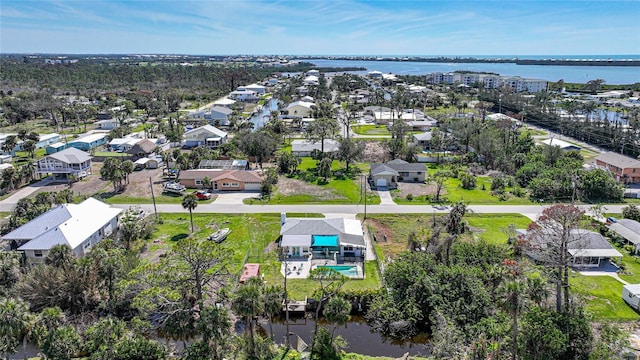 aerial view featuring a water view and a residential view