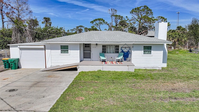 ranch-style home with driveway, a shingled roof, a chimney, a porch, and a front yard