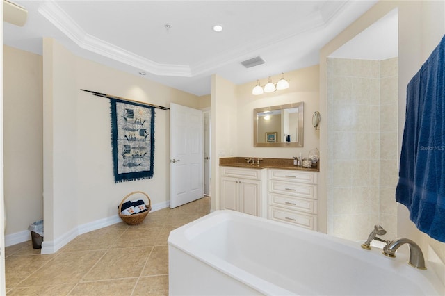 bathroom featuring tile patterned flooring, vanity, baseboards, a tub, and crown molding