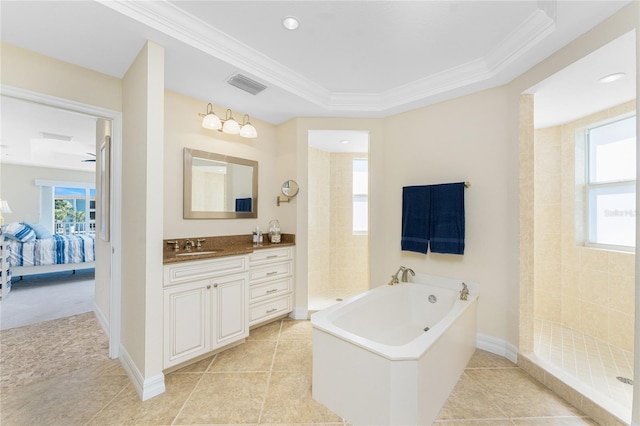 bathroom featuring crown molding, visible vents, and plenty of natural light