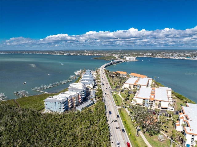 birds eye view of property featuring a water view