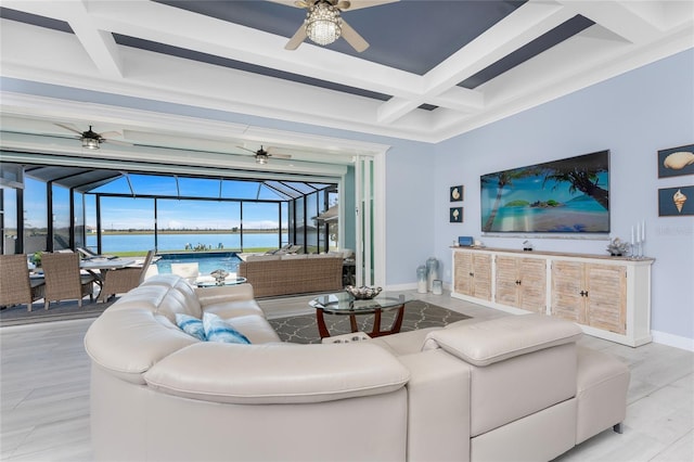 living area with a sunroom, baseboards, coffered ceiling, and a ceiling fan