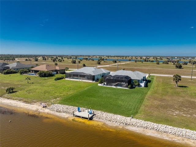 bird's eye view featuring a water view and a residential view