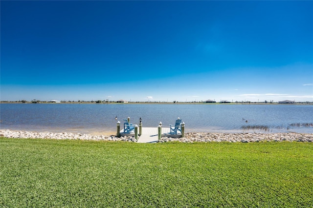 property view of water featuring a boat dock