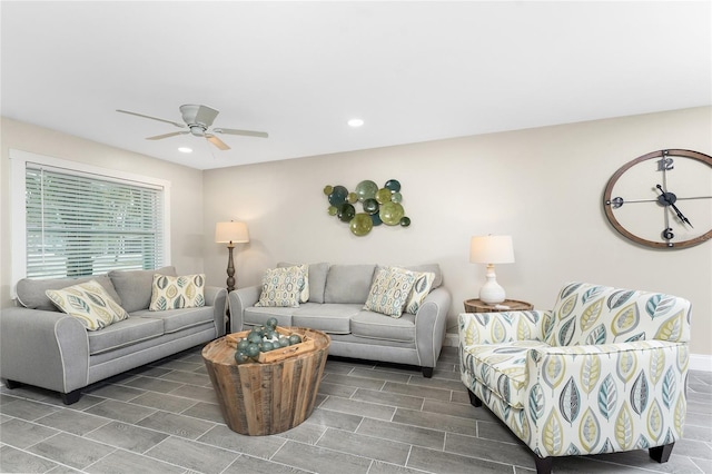 living room featuring ceiling fan and recessed lighting