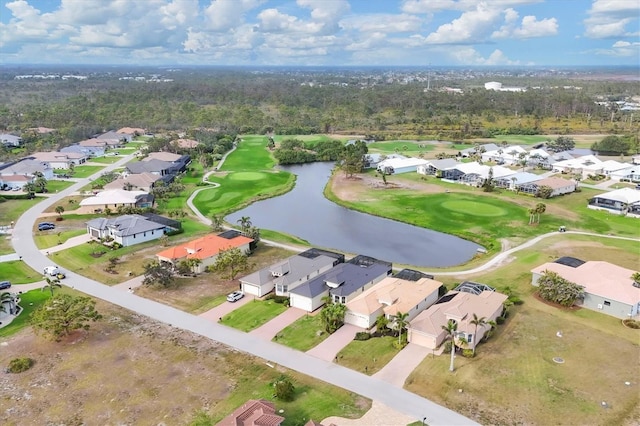 birds eye view of property with a residential view, a water view, and golf course view