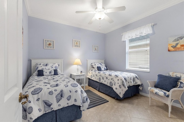 bedroom featuring baseboards, ceiling fan, light tile patterned floors, and crown molding