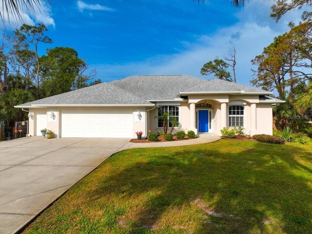 ranch-style house with a garage, a front yard, concrete driveway, and stucco siding