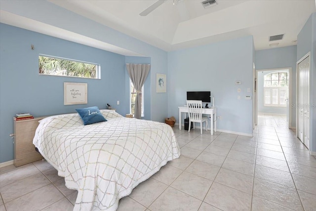 bedroom with baseboards, visible vents, and light tile patterned flooring