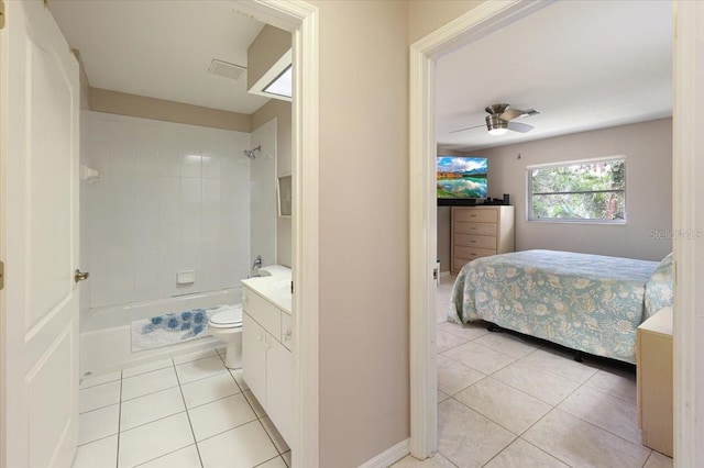 bedroom featuring light tile patterned flooring, ceiling fan, and visible vents