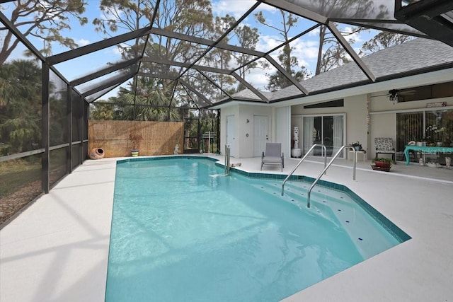 pool with a patio and a lanai