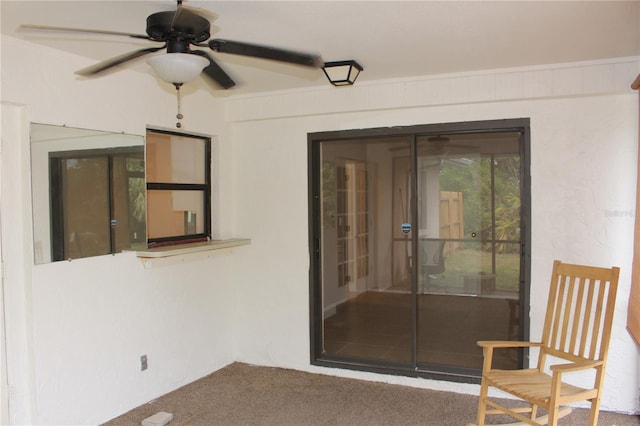 view of patio / terrace featuring a ceiling fan