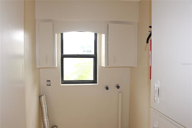 washroom with laundry area, washer hookup, and electric dryer hookup