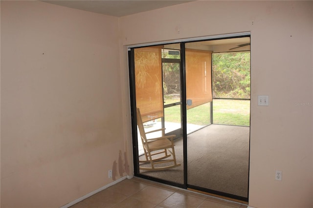 entryway featuring light tile patterned floors