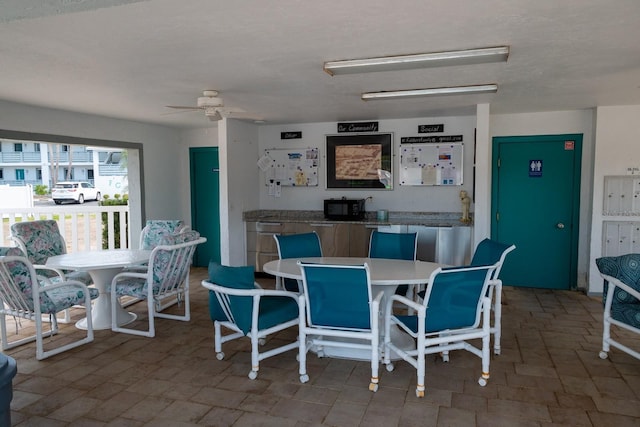 dining room featuring a ceiling fan