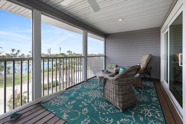 sunroom / solarium with ceiling fan