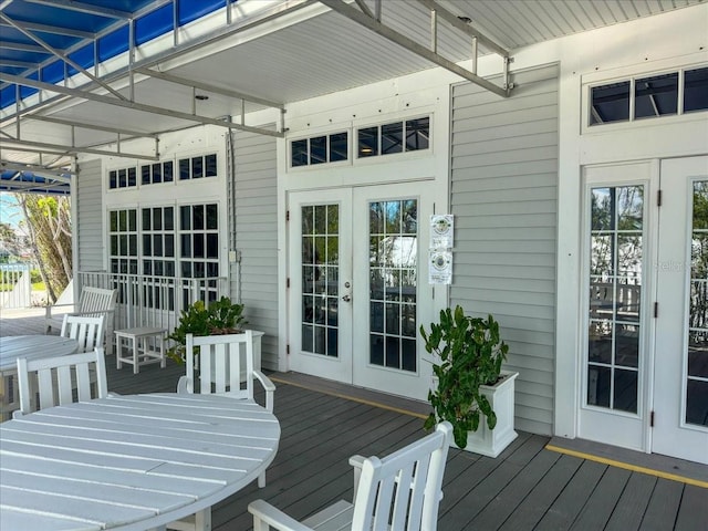 wooden terrace featuring french doors