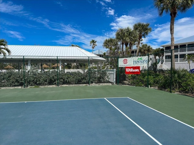 view of sport court with community basketball court and fence