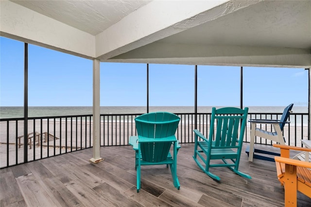 sunroom with a water view