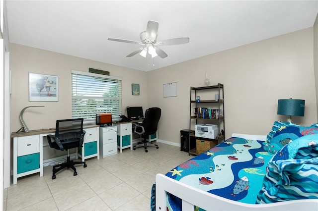 bedroom featuring light tile patterned flooring, a ceiling fan, and baseboards