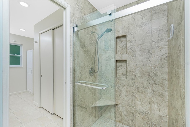 full bath featuring a stall shower and tile patterned floors