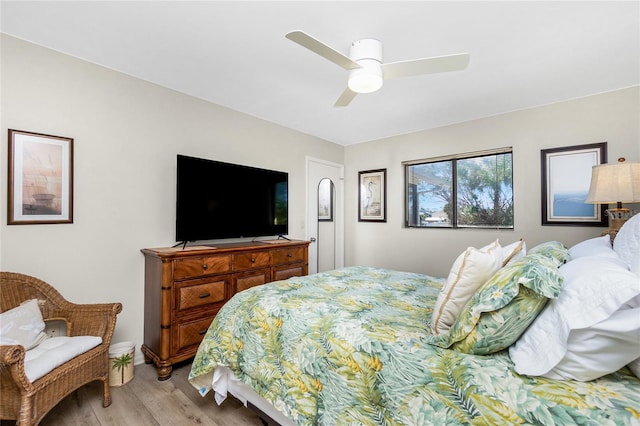 bedroom featuring ceiling fan and light wood finished floors