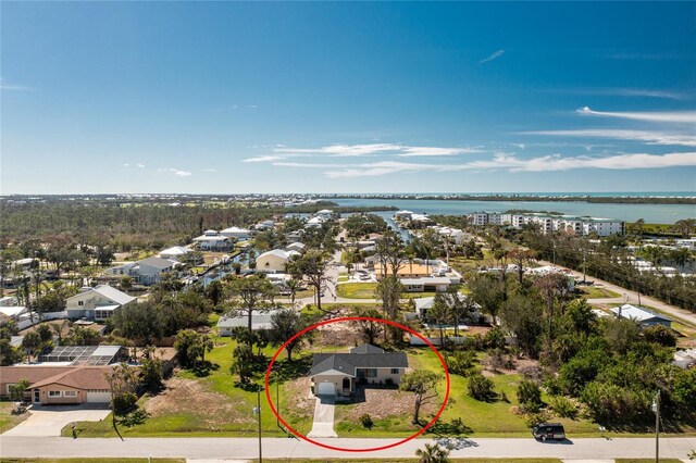 aerial view featuring a residential view and a water view