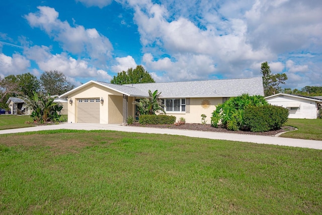 ranch-style house featuring driveway, a front lawn, an attached garage, and stucco siding