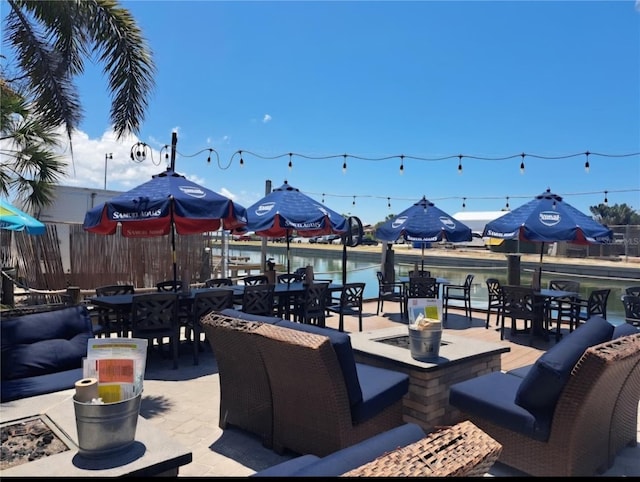 view of patio featuring outdoor dining area