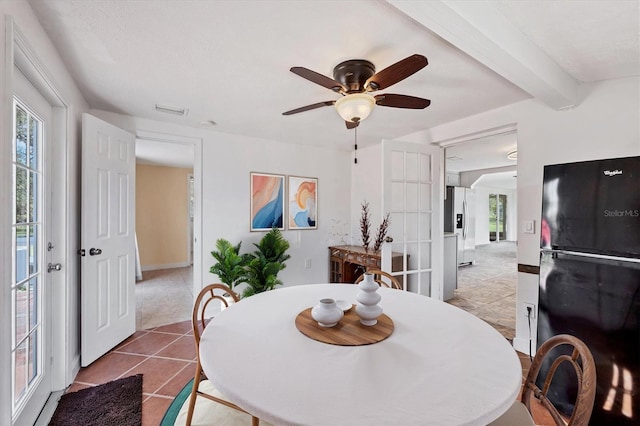 840 E 7th St, Englewood, FL 34223 - tiled dining area with ceiling fan and beamed ceiling