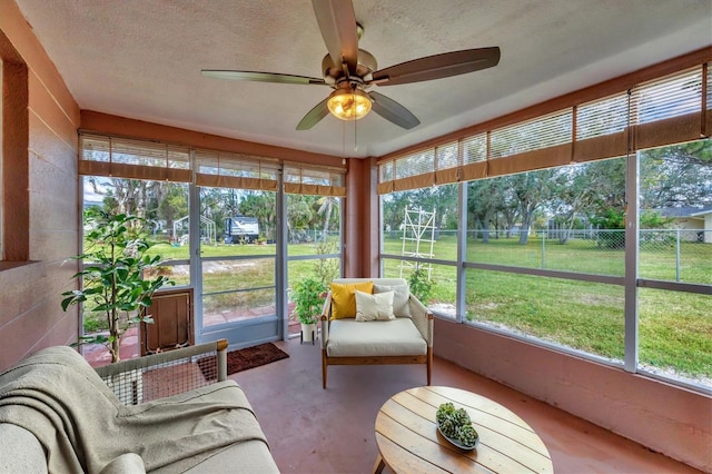 840 E 7th St, Englewood, FL 34223 - sunroom / solarium featuring a ceiling fan and plenty of natural light