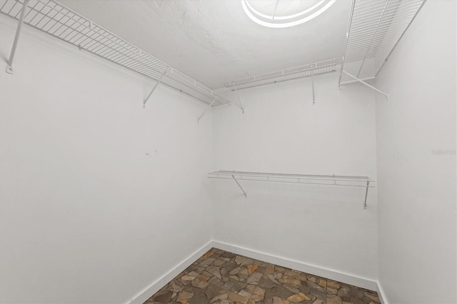840 E 7th St, Englewood, FL 34223 - spacious closet with dark stone finish flooring