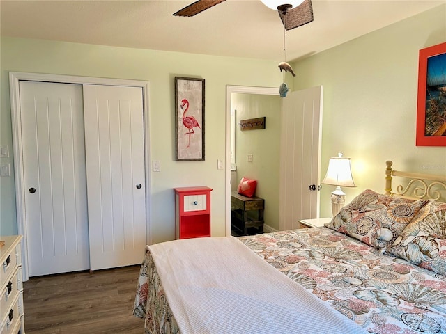 bedroom with ceiling fan, a closet, and dark wood finished floors