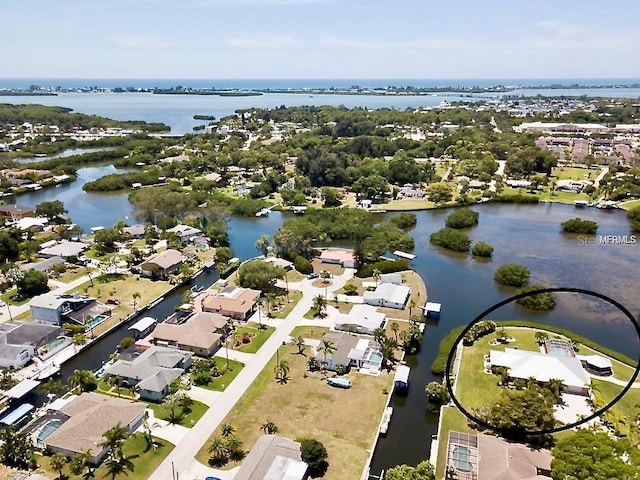 aerial view featuring a residential view and a water view