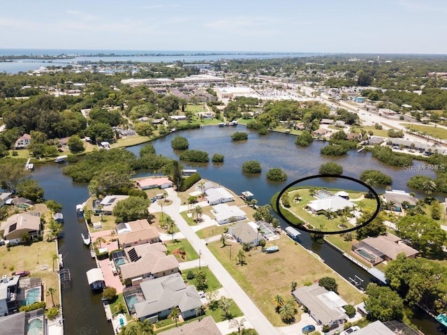 aerial view featuring a water view and a residential view