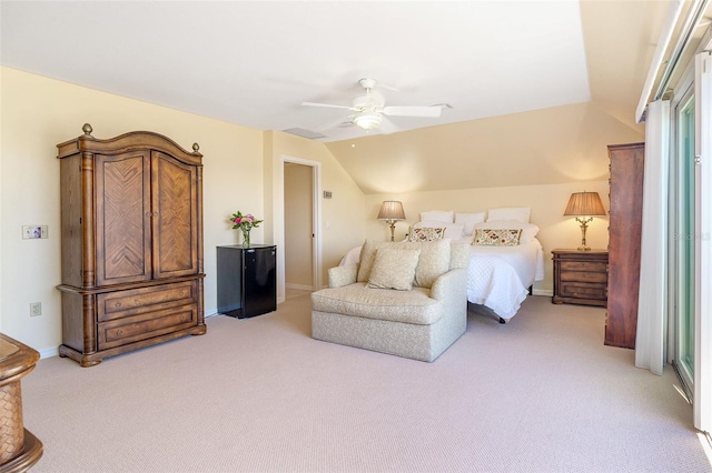 bedroom featuring carpet flooring, vaulted ceiling, baseboards, and ceiling fan