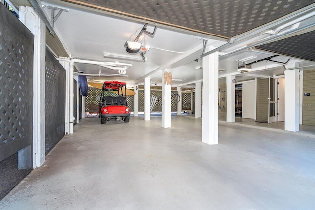 garage featuring a garage door opener