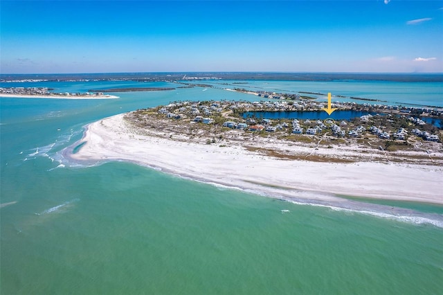 drone / aerial view with a view of the beach and a water view