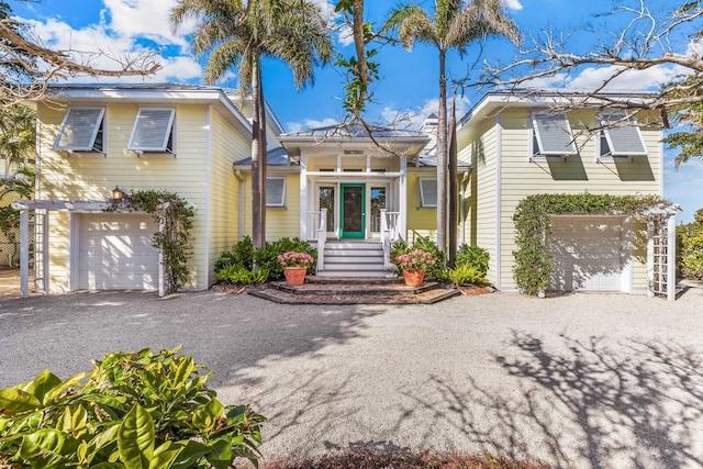 view of front of house with an attached garage and driveway